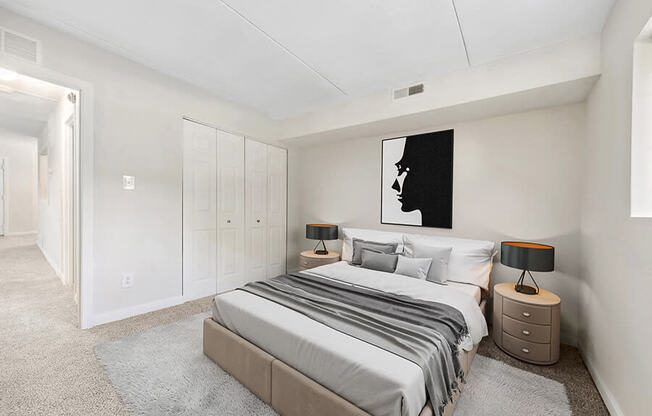 Model Bedroom with Carpet and Closet at Heights Marlborough Apartments in Boston, MA.