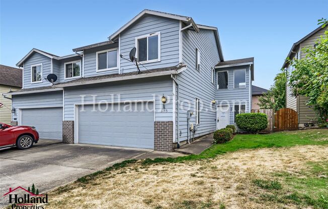 Cozy Two-Level Duplex Home with Fenced Backyard in Hillsboro!