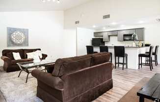 Living Room With Kitchen View at Summit Ridge Apartments, Temple, TX