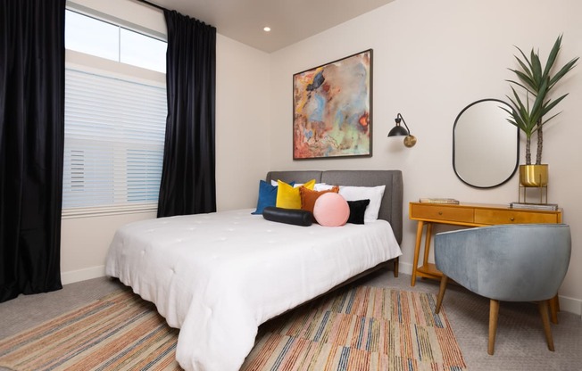 model apartment bedroom with large window at Solasta, Sacramento, CA, 95831