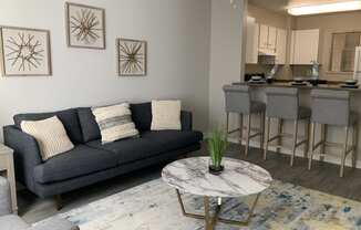 Modern Living Room With Kitchen View at Del Norte Place Apartment Homes, El Cerrito, CA