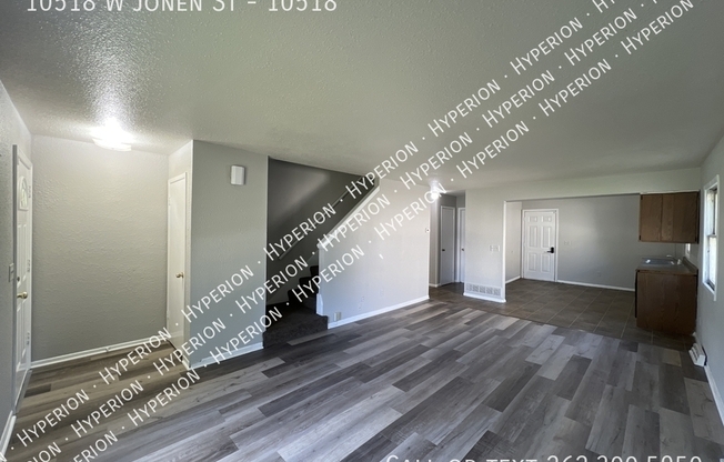 10518 W JONEN ST