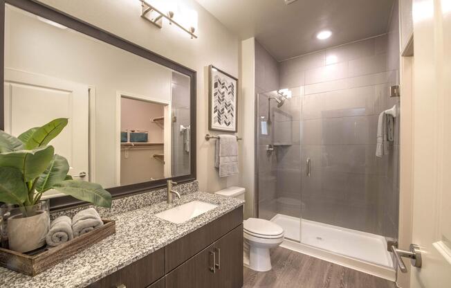 a room with a sink and a mirror