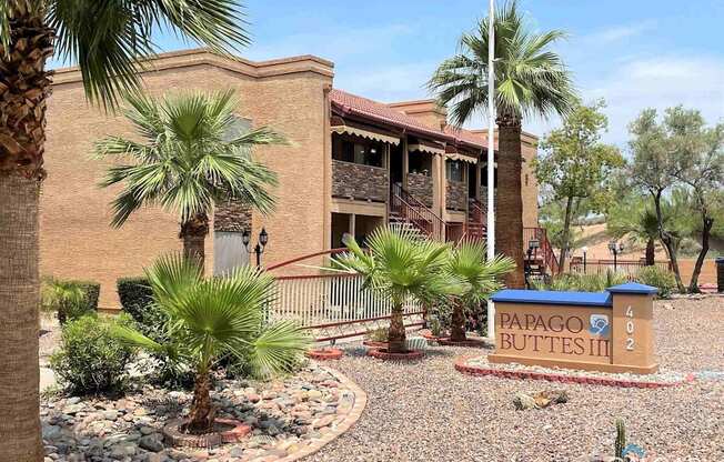 A building with a sign that says Papago Buttes III.