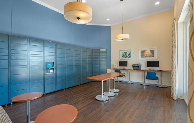 A room with a blue wall and a wooden table.