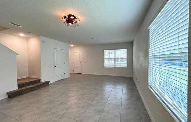 Stunning 3/2.5 Modern Townhome with a Loft Area in the New Rivington Community - DeBary!
