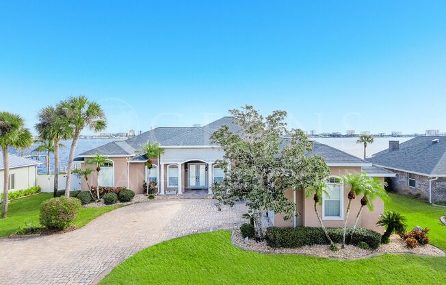 Stunning RIVERFRONT Pool Home with New Price Improvement