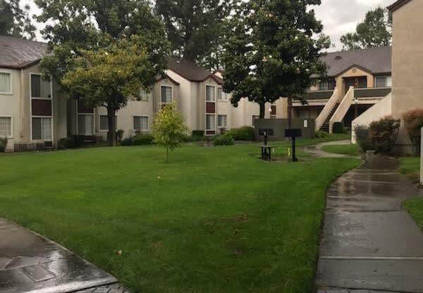 Beautiful green space between buildings at Northwood Apartments in Upland, California.