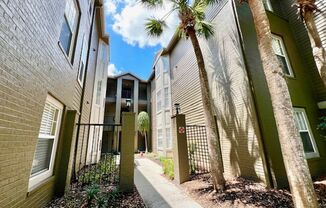 MOVE NOW-Remodeled bathroom & kitchen! NEW VINYL PLANK flooring & fresh paint! 2 bedroom 1 bath condo on 3rd floor in gated community! Water,sewer,& basic internet included with HOA!!