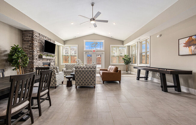 Clubhouse dining table with chairs  at Signature Pointe Apartment Homes, Alabama, 35611