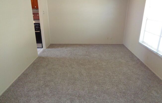 Cute Single Level Northeast Home With Evaporative Air Located In Quiet Neighborhood