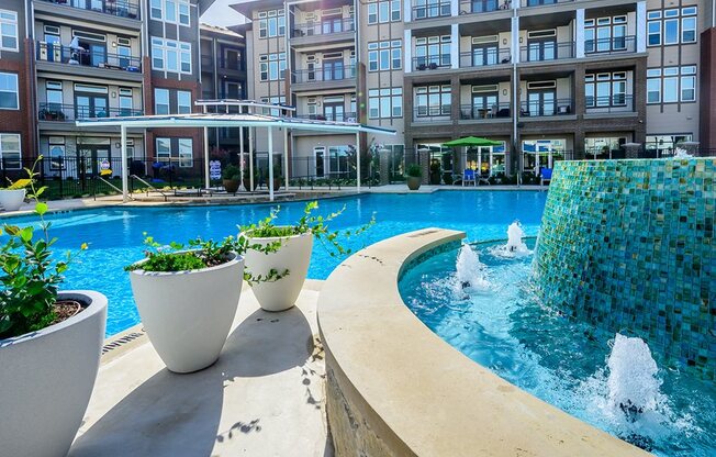 Discover an Apartment Home that Overlooks this Stunning Resort-Inspired Swimming Pool