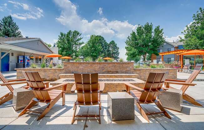A sunny day at the outdoor seating area with wooden chairs and tables.