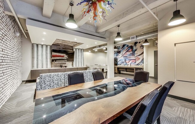 a conference room with a wooden table and chairs