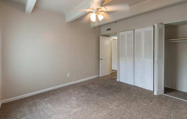 This is a photo of the second bedroom in the 965 square foot 2 bedroom, 2 bath  apartment at Harvard Square Apartments, in Dallas, TX.