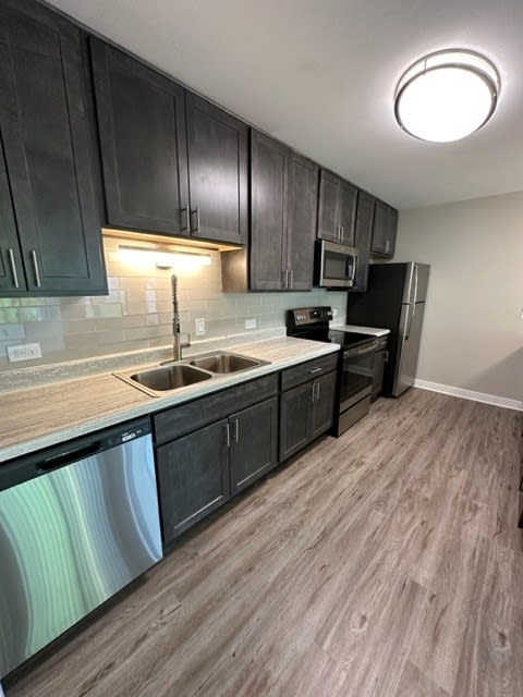 Gorgeous Slate/Shaker Cabinetry & Subway Tile Backsplash