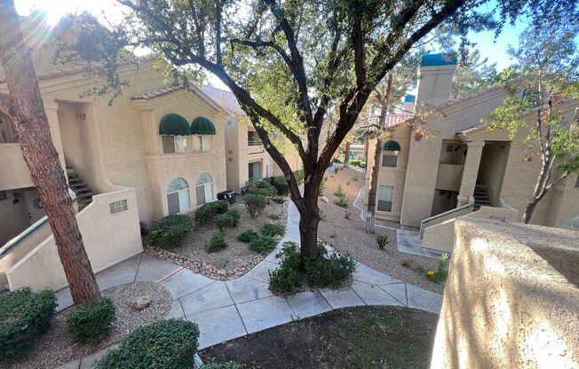 Charming 1 Bedroom Condo with Detached 1 Car Garage!