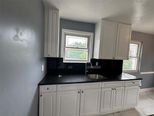 153 32 77 AVE