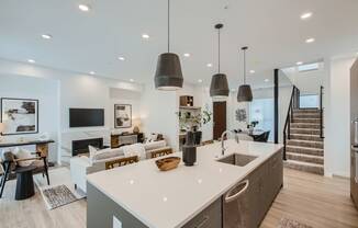 a kitchen and living room in a house