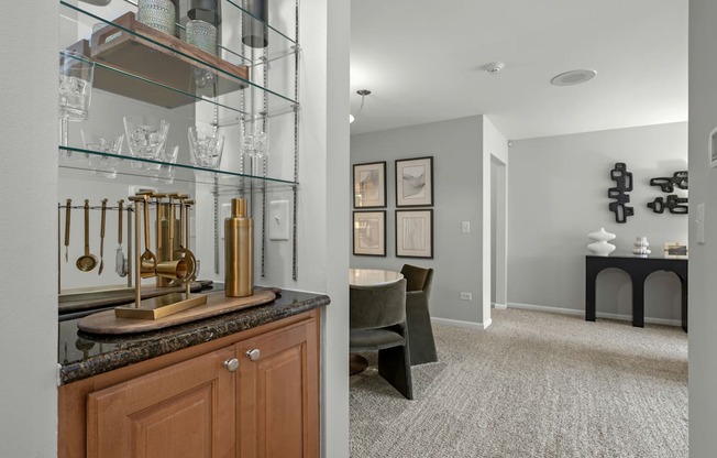 A kitchen with a counter and a chair.