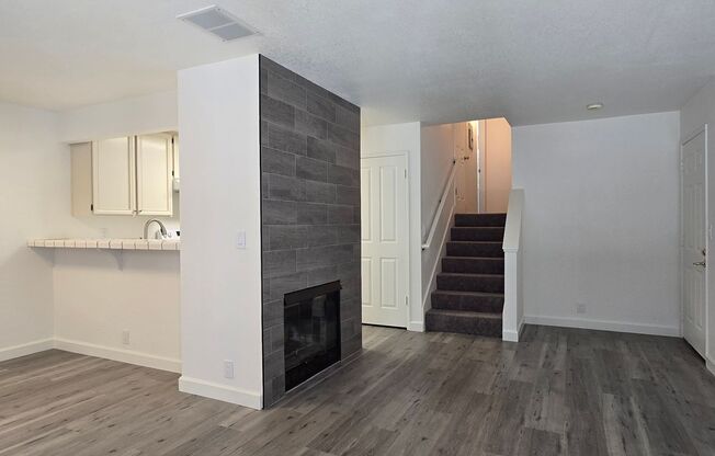 Large Downstairs Condo in Nice Community, New Wood Flooring, Fresh Paint, Garage, Great Location!