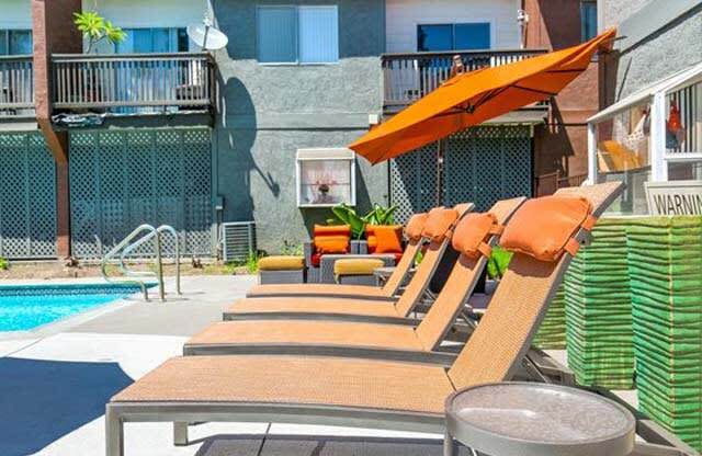 Sparkling Pool Featuring Various Lounge Areas at Encore Apartments, Ontario