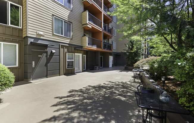 Outdoor Area with views of unit balconies at Illumina Apartment Homes, Washington