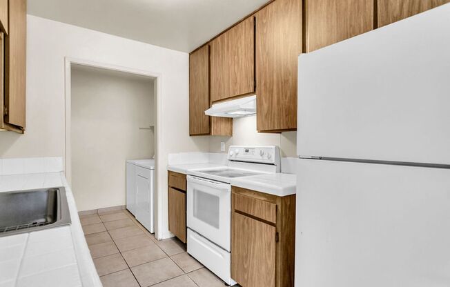 Great three bedroom/two bath single level corner townhome in UTC!