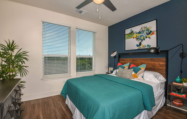 Bedroom with wood floooring at The Exchange Luxury Apartments in St. Petersburg, FL