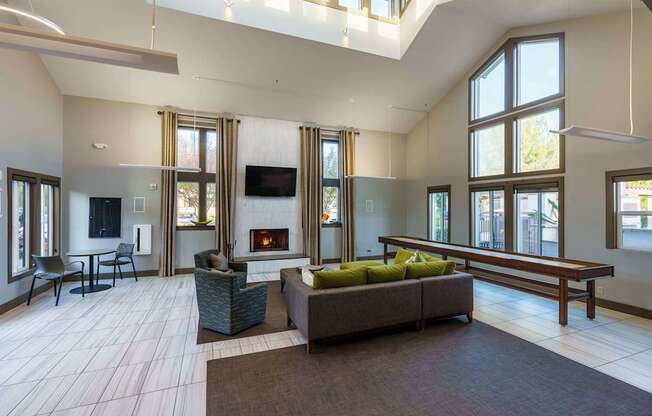 A living room with a fireplace and a couch.