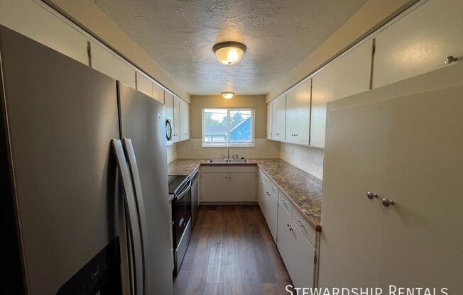 1859 W 12 AVE