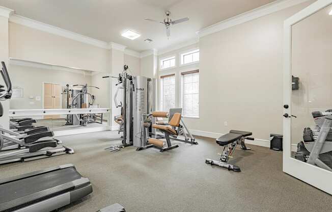 the gym at the enclave at woodbury apartments gym