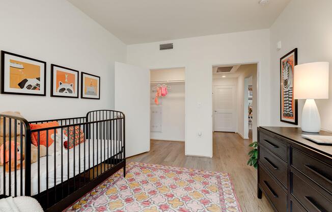 a living room filled with furniture and a bed