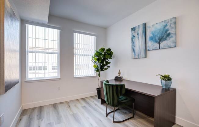 the preserve at ballantyne commons living room with desk and chair and windows