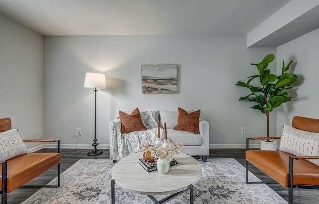 a living room with couches and a coffee table