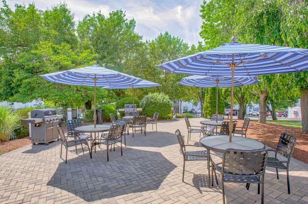 Outdoor seating area at Middletown Brooke Apartments, Middletown, Connecticut