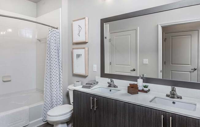 Bathrooms with dual vanities and garden soaking tubs