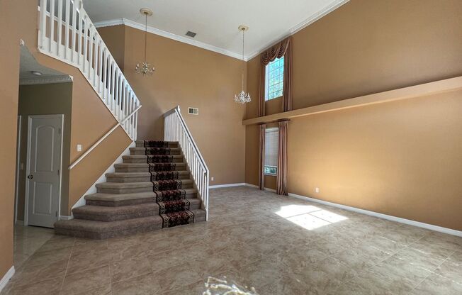 Executive 4/3.5 Pool Home with Water View w/3-Car Garage in Lee Vista Area close to Lake Nona