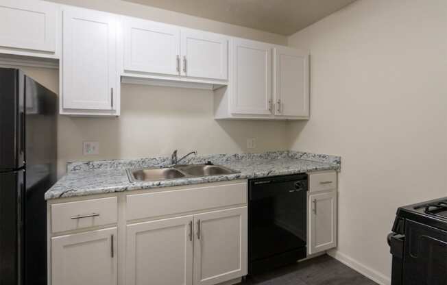 This is a photo of the kitchen in the 543 square foot A-style, 1 bedroom, 1 bath apartment at Blue Grass Manor Apartments in Erlanger, KY.