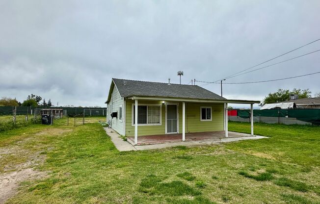 Country living 2 bedroom 1 bathroom house on .67 acres