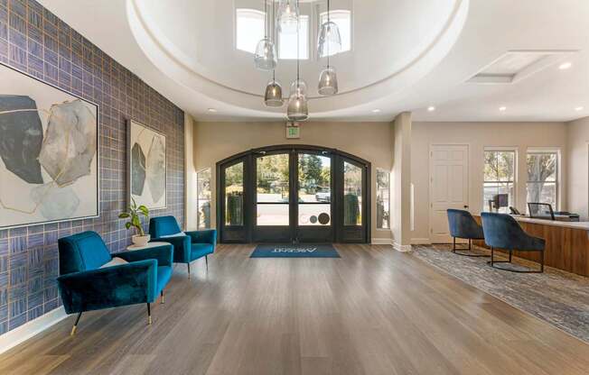 The entrance to the leasing office and clubhouse is warm and welcoming, designed to make all residents and guests feel at home the moment they arrive at Ascent at the Galleria.