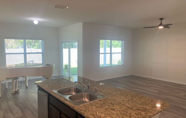 Beautiful Home Located In The New Chestnut Village Neighborhood On SW Archer Road