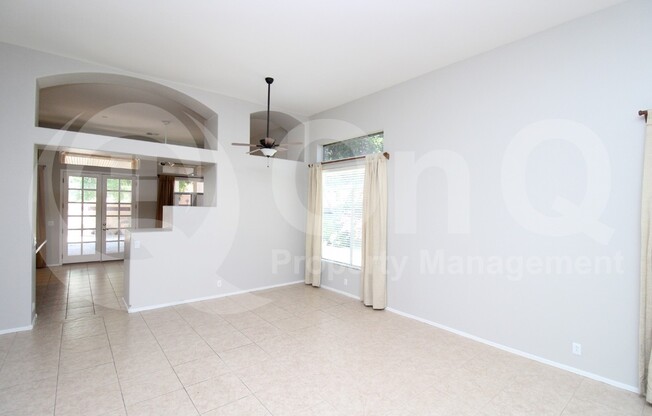 5997 W AURORA DR