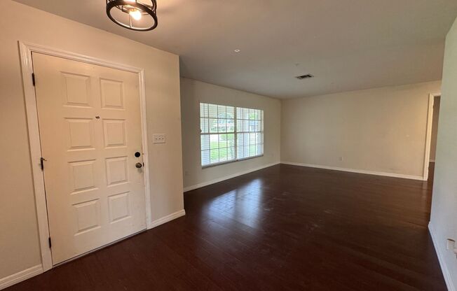 Eustis Lake Front Home with 2 Primary Bedrooms!