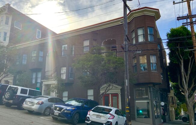 REMODELED, Corner 2BR. IN-UNIT LAUNDRY! Dishwasher! GREAT Location!