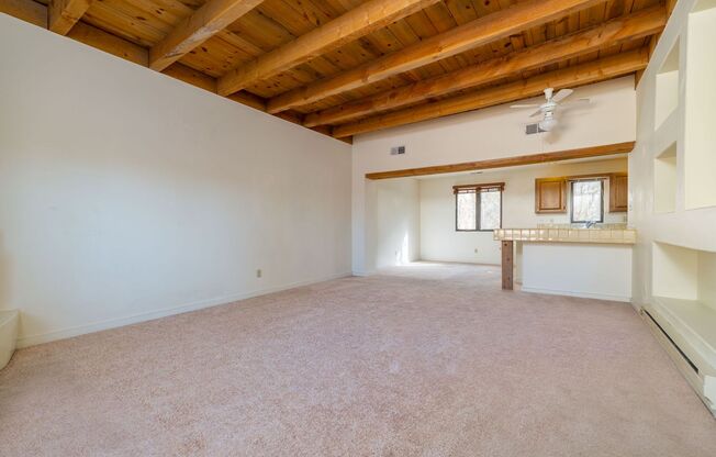 Two Story Condo Just off Old Taos Highway Available Now!