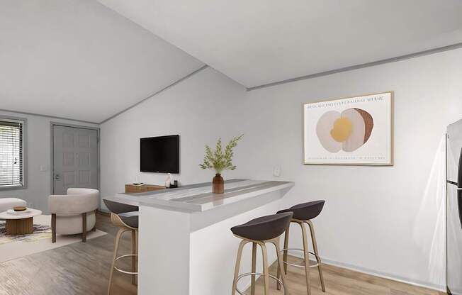 Retreat at Indian Lake apartments in Hendersonville, TN modern kitchen with a bar area and a framed artwork on the wall.