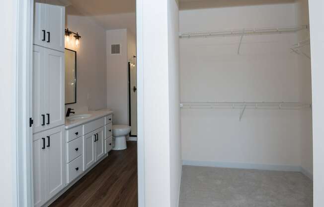 a view of a bathroom with a shower and sink and a toilet at The Crossings at Windsong, Prescott Valley, 86314