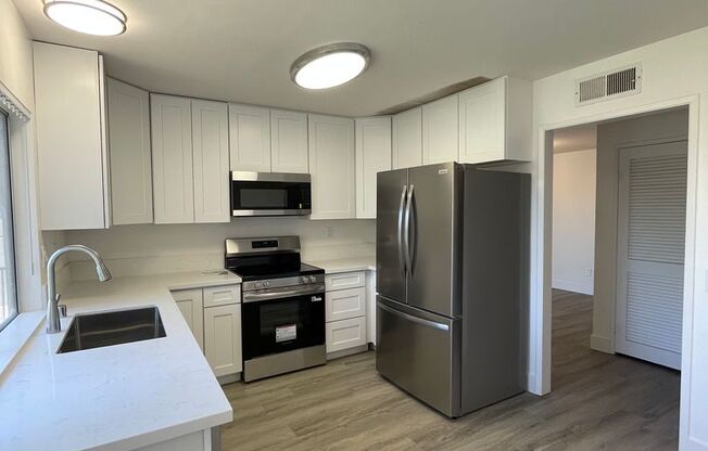 Great Updated  2BR/2BA Single story  Condo in Oaks North W/Views and 1 Car Detached Garage