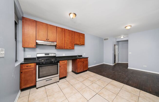 6553-6555 S Martin Luther King Dr [400-410 E 66th St]